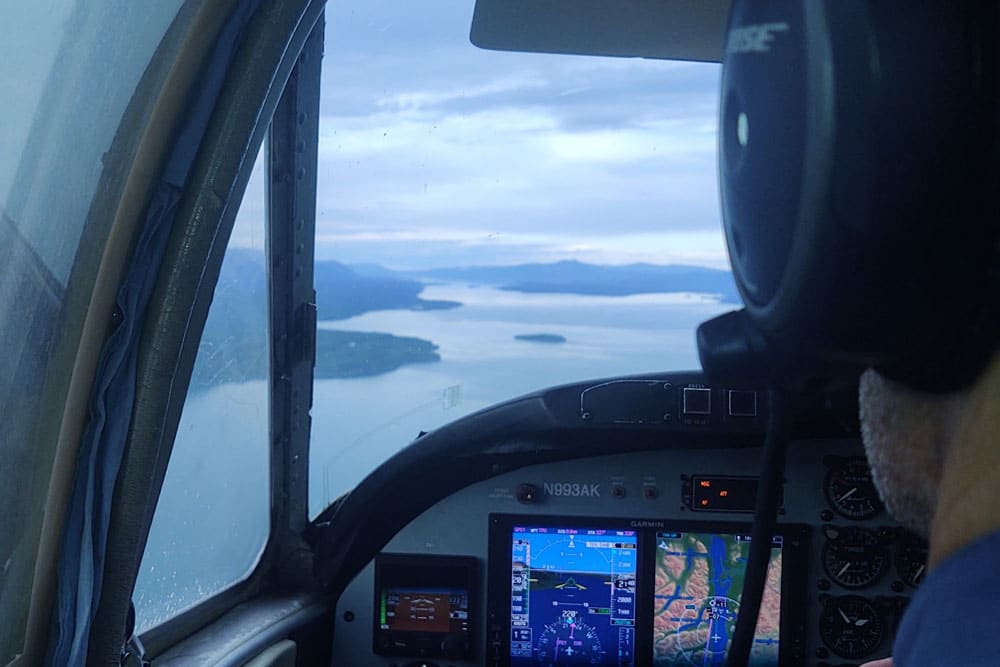 Person flying a plane